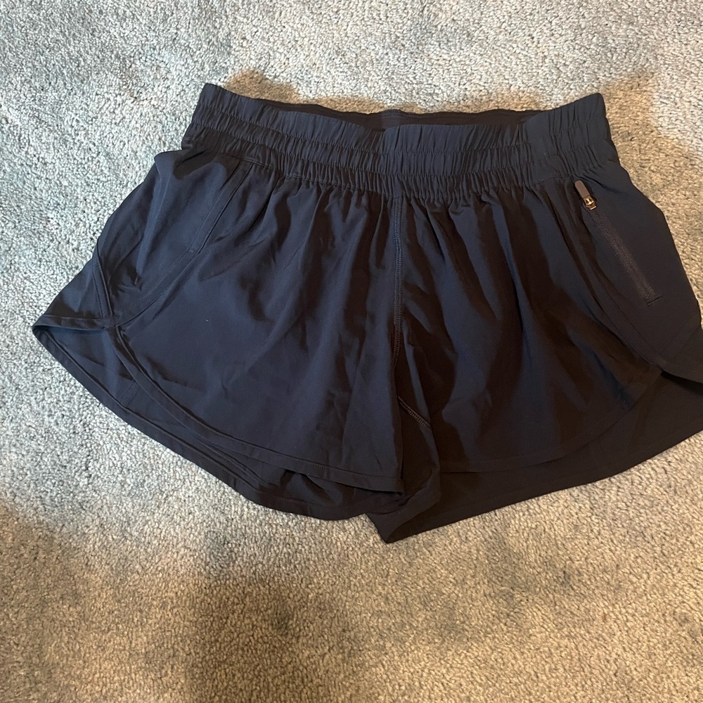 Lululemon navy blue Tracker Short size 10 worn very few times!